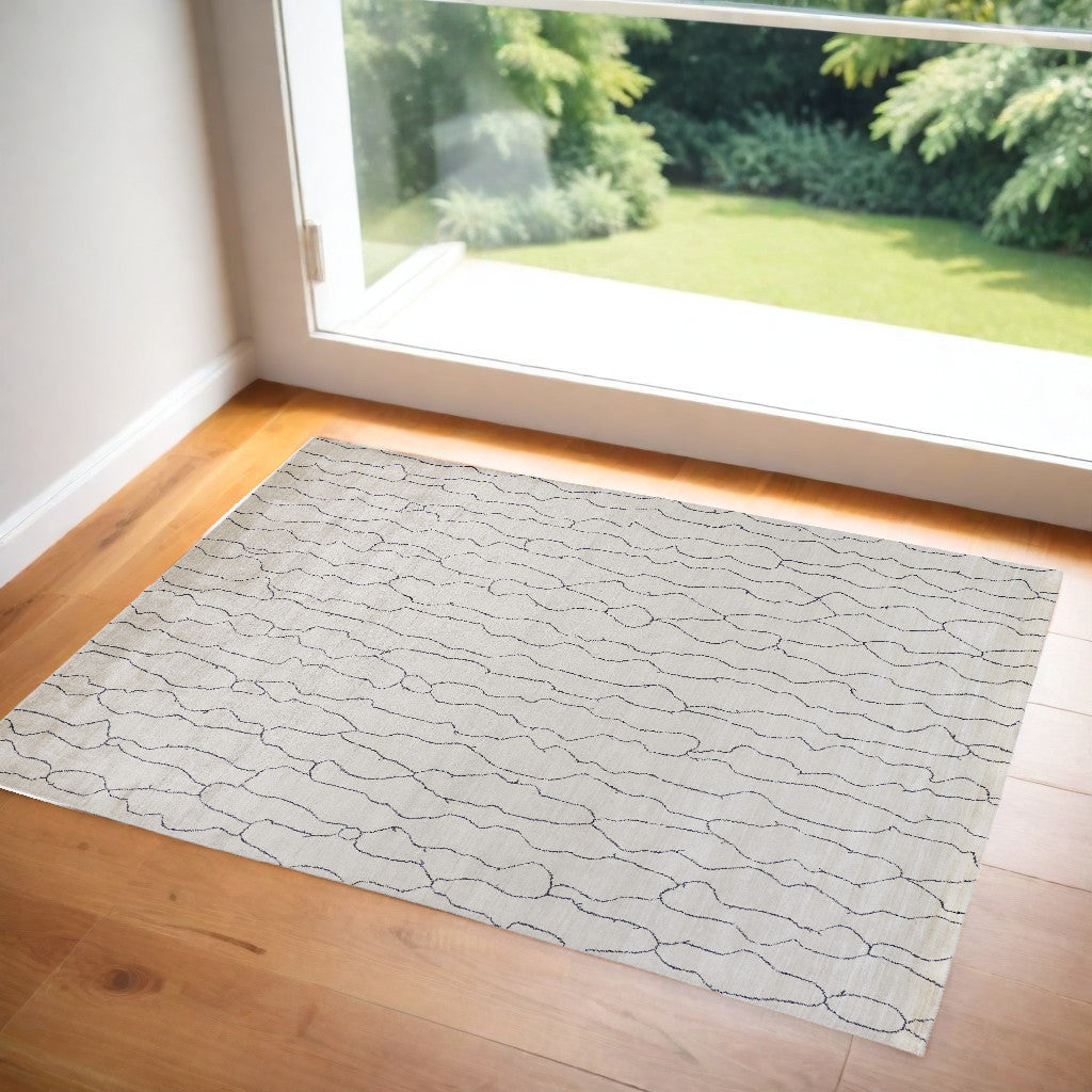 4' X 6' Ivory And Gray Abstract Hand Woven Area Rug