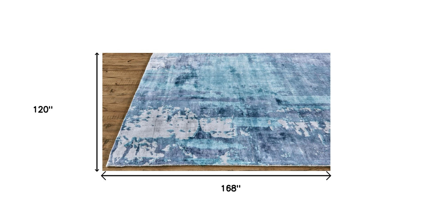 10' X 14' Blue And Ivory Abstract Hand Woven Area Rug