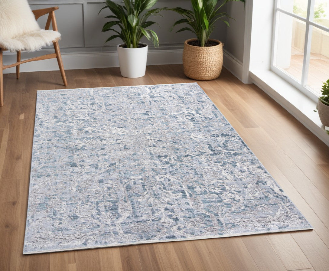 4' X 6' Blue and Gray Abstract Distressed Area Rug With Fringe