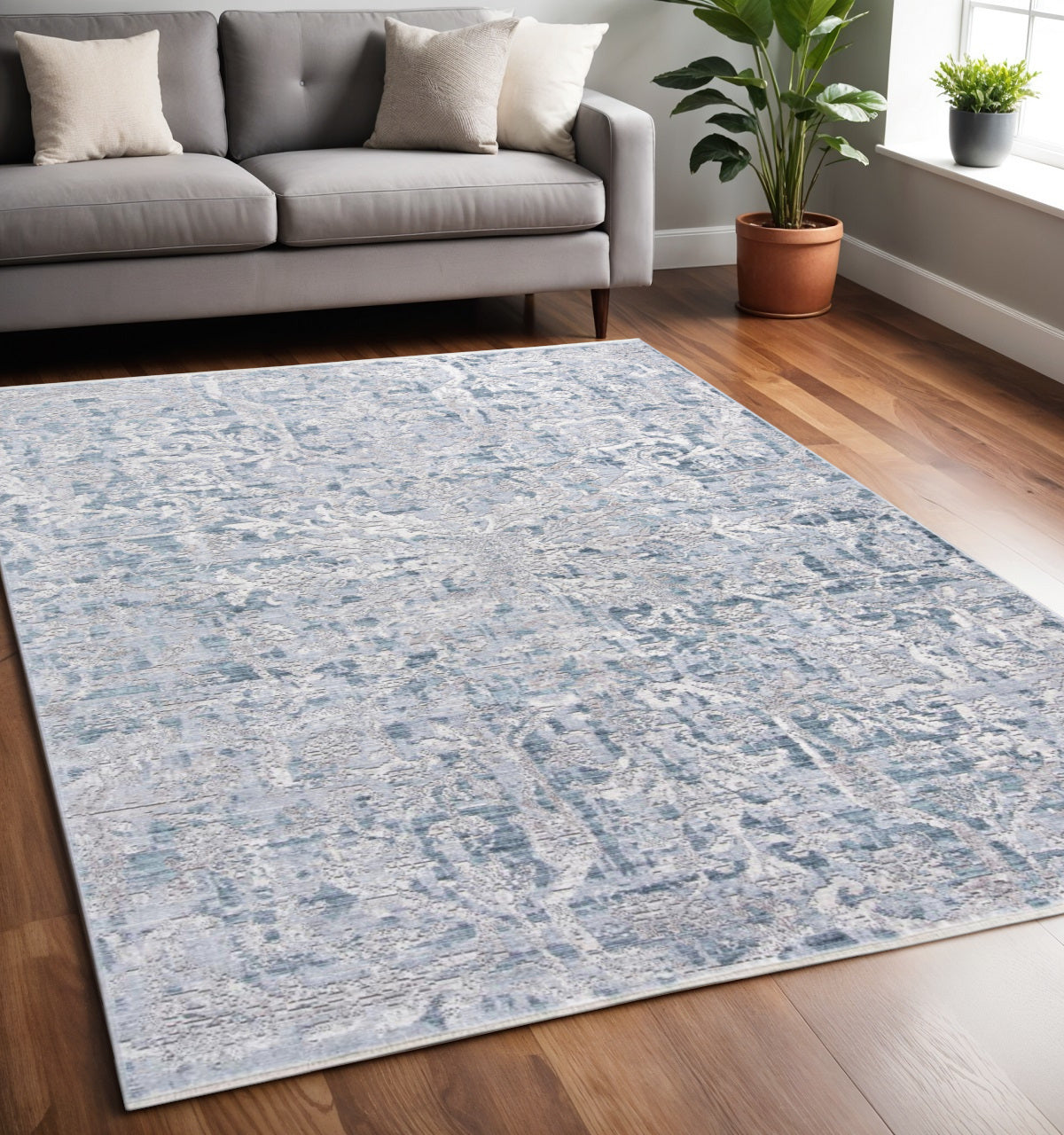 4' X 6' Blue and Gray Abstract Distressed Area Rug With Fringe