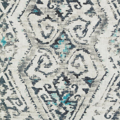 Rectangular distressed grey rug with black damask medallion pattern and teal accents.