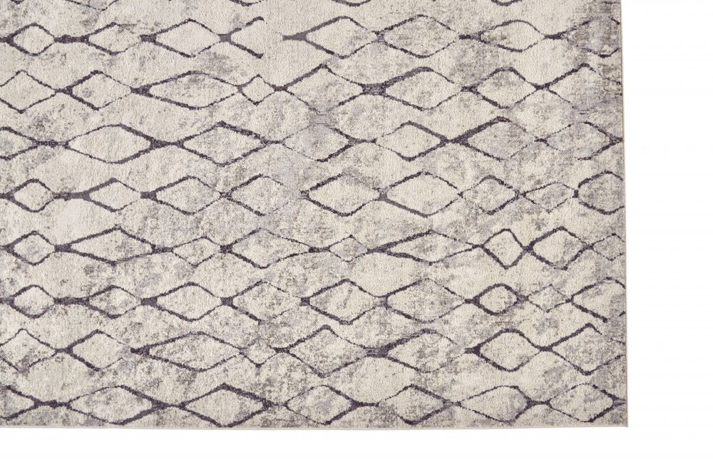 5' X 8' Gray And Ivory Geometric Area Rug