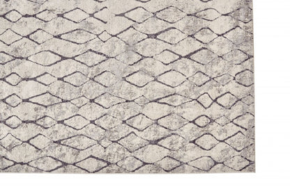 5' X 8' Gray And Ivory Geometric Area Rug