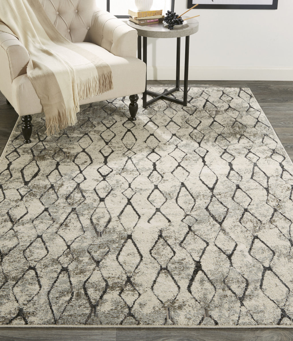 7' X 10' Ivory Gray And Taupe Abstract Stain Resistant Area Rug