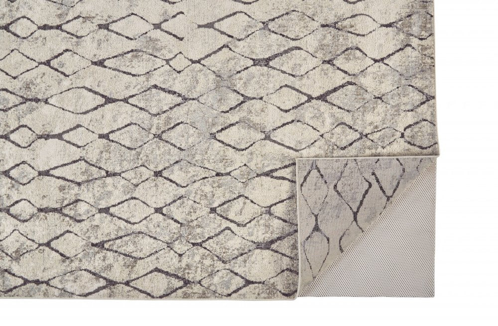 5' X 8' Gray And Ivory Geometric Area Rug