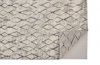5' X 8' Gray And Ivory Geometric Area Rug