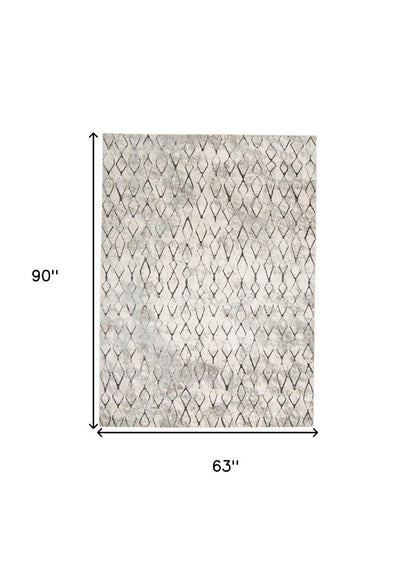 5' X 8' Gray And Ivory Geometric Area Rug
