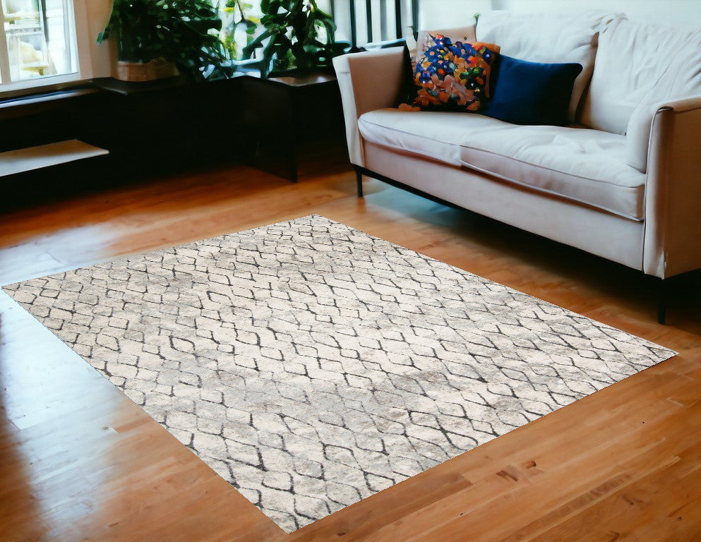 7' X 10' Ivory Gray And Taupe Abstract Stain Resistant Area Rug