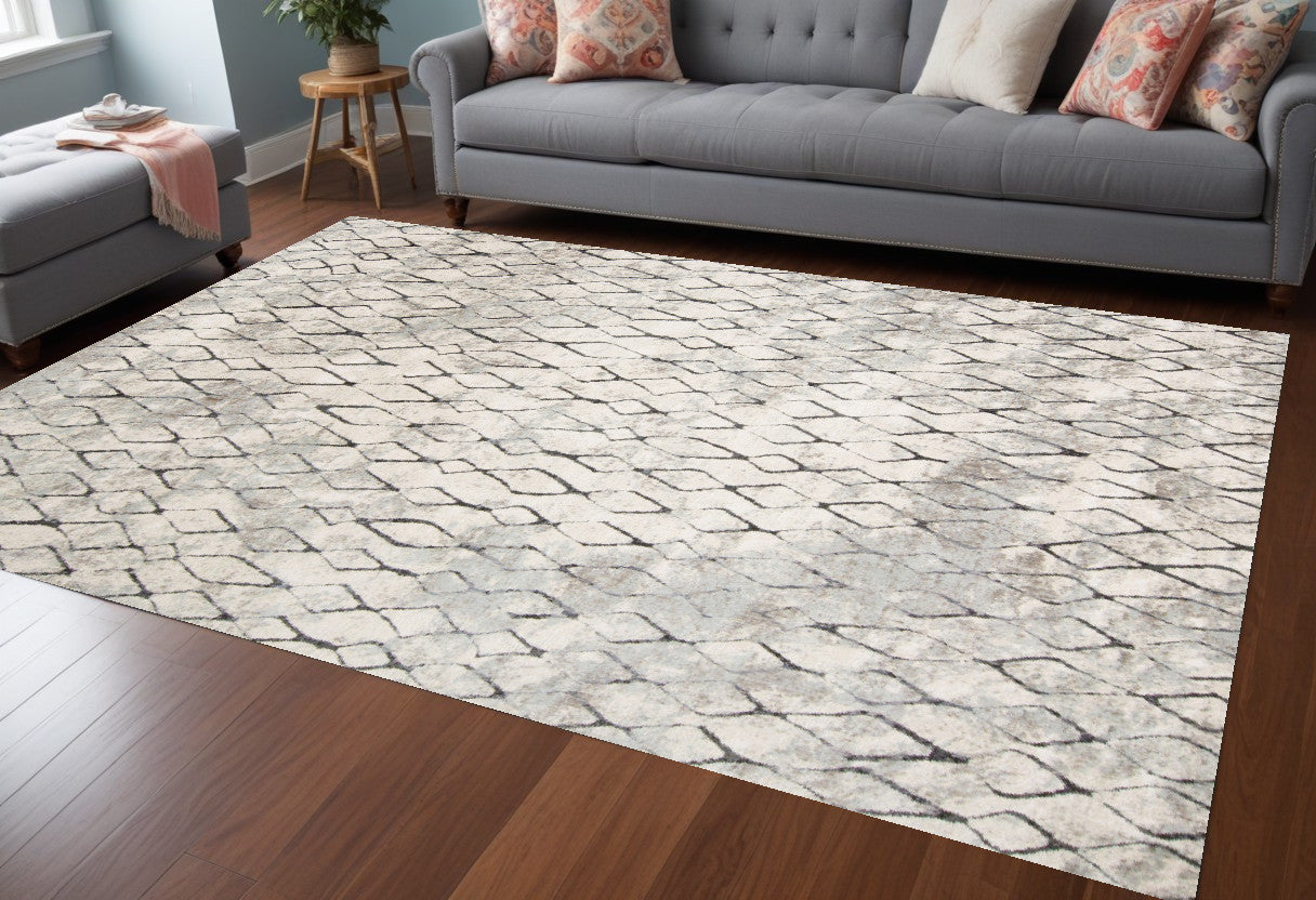 4' X 6' Ivory Gray And Taupe Abstract Stain Resistant Area Rug