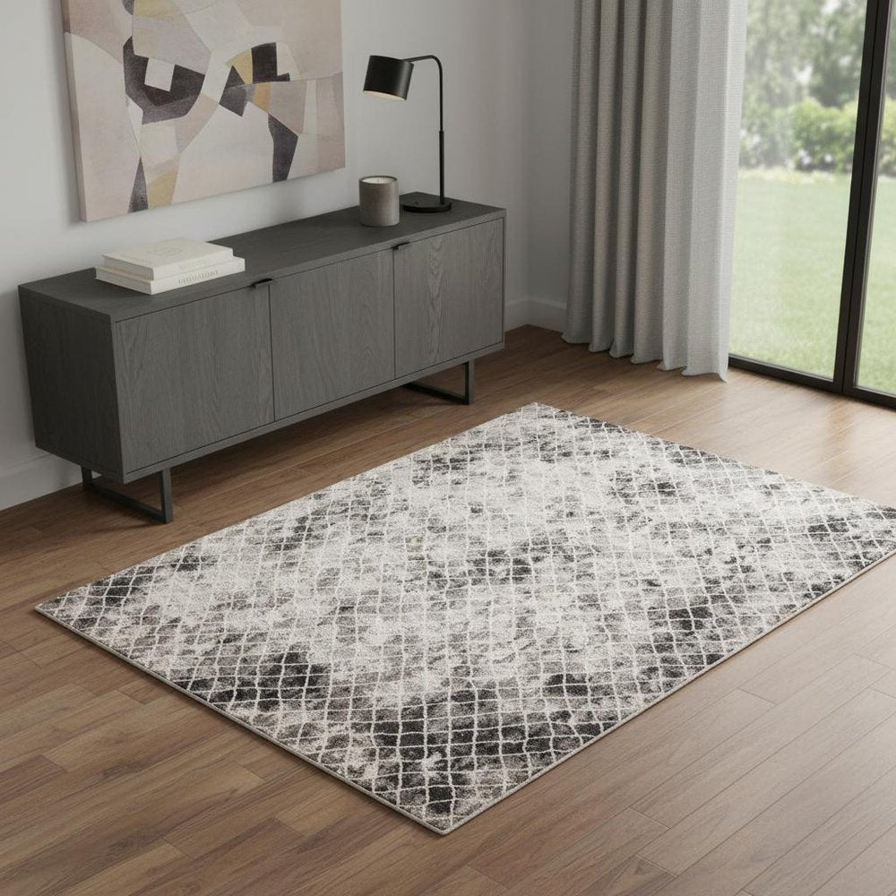 5' X 8' Ivory Gray And Taupe Abstract Stain Resistant Area Rug