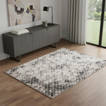 5' X 8' Ivory Gray And Taupe Abstract Stain Resistant Area Rug