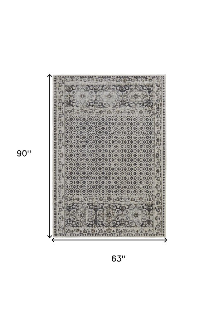 7' X 10' Gray and Ivory Abstract Area Rug