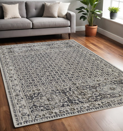 7' X 10' Gray and Ivory Abstract Area Rug