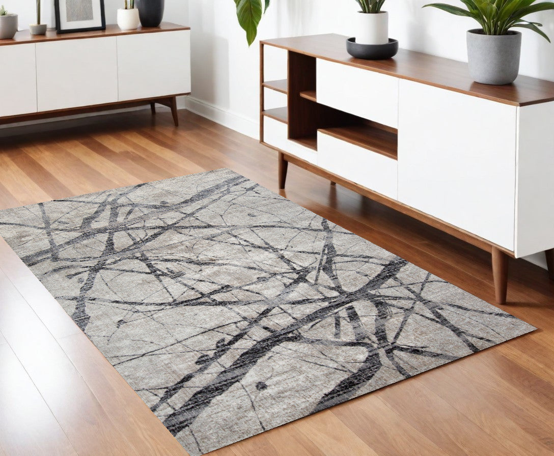 4' X 6' Taupe Gray And Ivory Abstract Stain Resistant Area Rug