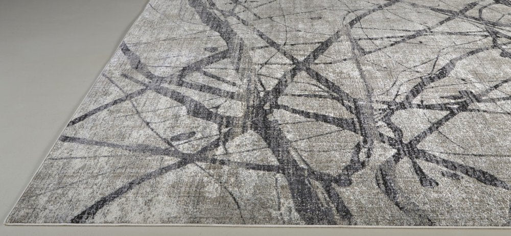 5' X 8' Taupe Gray And Ivory Abstract Stain Resistant Area Rug