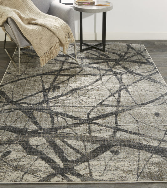 7' X 10' Taupe Gray And Ivory Abstract Stain Resistant Area Rug