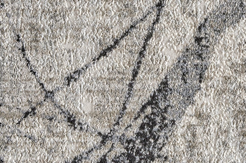 5' X 8' Taupe Gray And Ivory Abstract Stain Resistant Area Rug