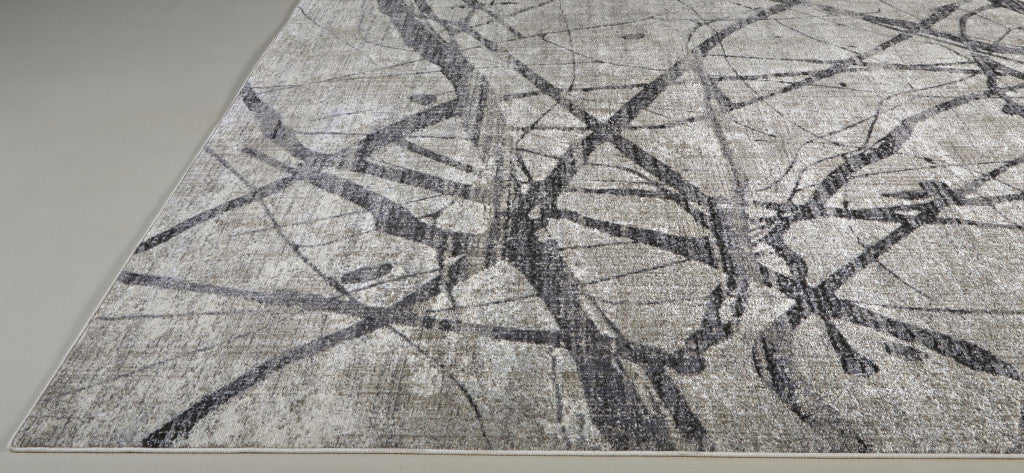 4' X 6' Taupe Gray And Ivory Abstract Stain Resistant Area Rug