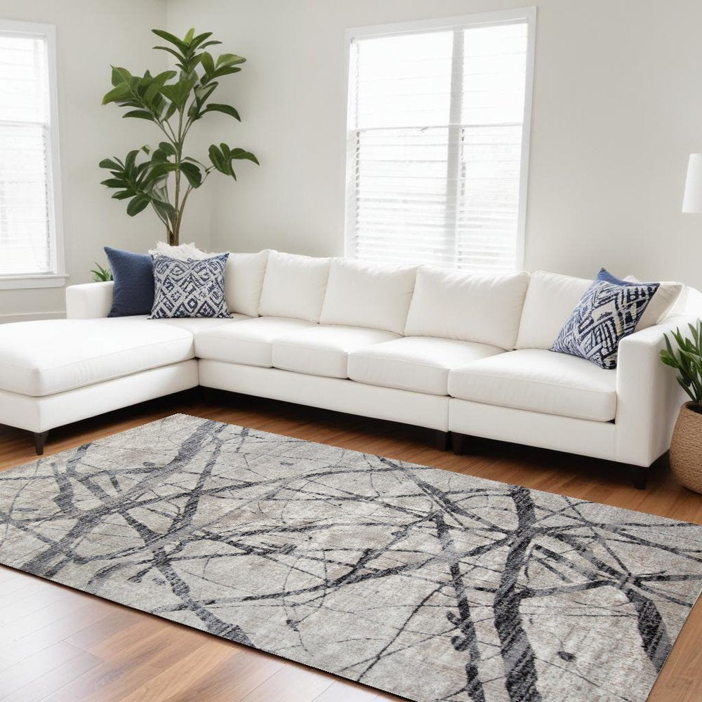 4' X 6' Taupe Gray And Ivory Abstract Stain Resistant Area Rug