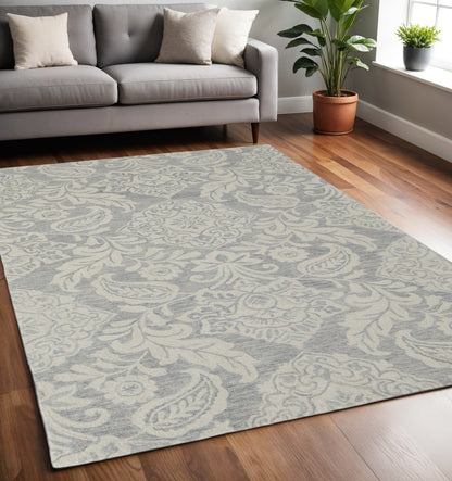 5' X 8' Blue And Ivory Wool Paisley Tufted Handmade Stain Resistant Area Rug