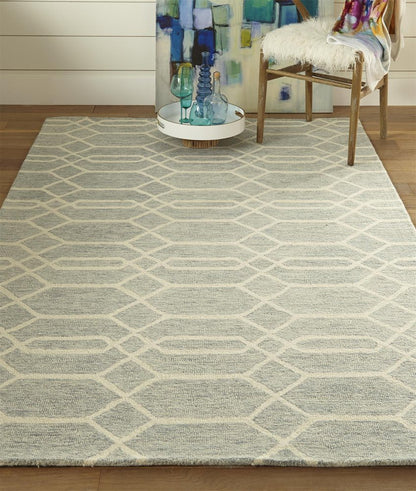5' X 8' Blue And Ivory Wool Geometric Tufted Handmade Stain Resistant Area Rug