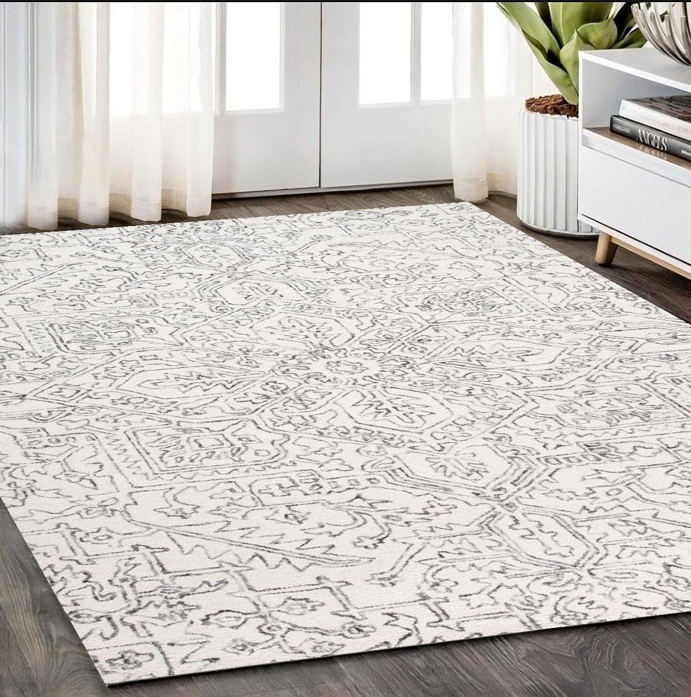 5' X 8' Ivory And Gray Wool Floral Tufted Handmade Stain Resistant Area Rug