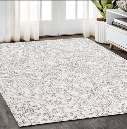 5' X 8' Ivory And Gray Wool Floral Tufted Handmade Stain Resistant Area Rug