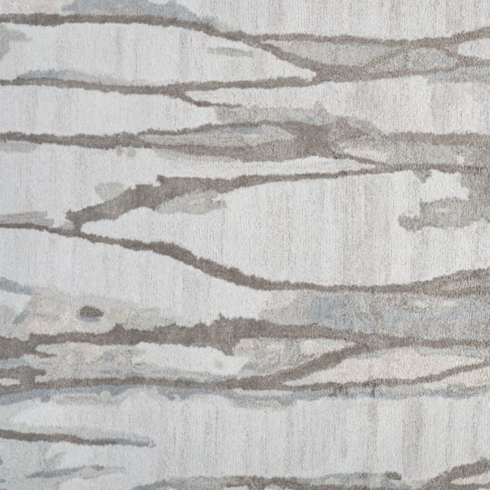 5' X 8' Taupe Ivory And Gray Abstract Tufted Handmade Area Rug