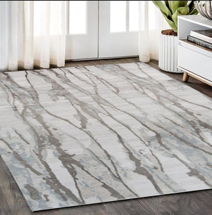 5' X 8' Taupe Ivory And Gray Abstract Tufted Handmade Area Rug