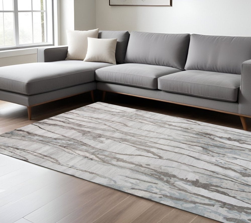 5' X 8' Taupe Ivory And Gray Abstract Tufted Handmade Area Rug