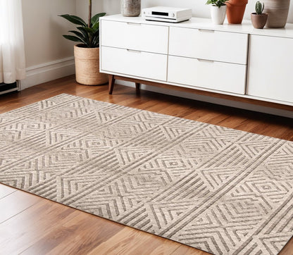 4' X 6' Tan Ivory And Brown Geometric Stain Resistant Area Rug