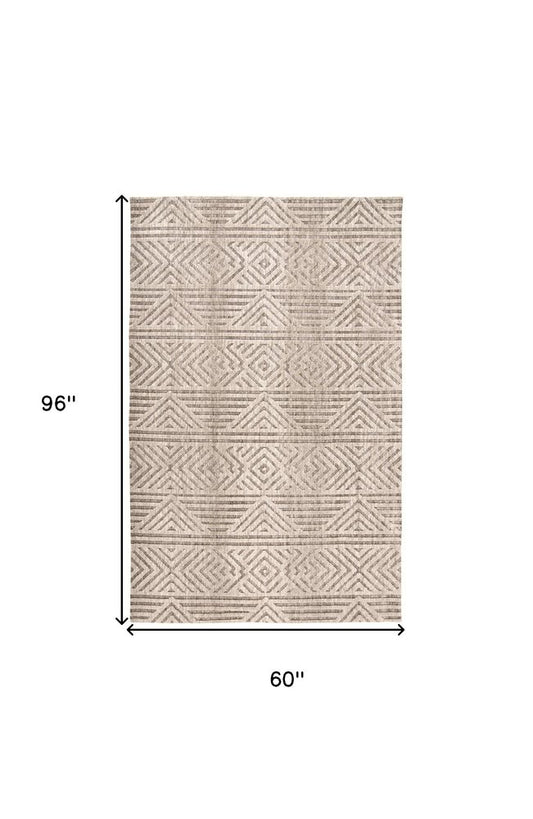 4' X 6' Tan Ivory And Brown Geometric Stain Resistant Area Rug