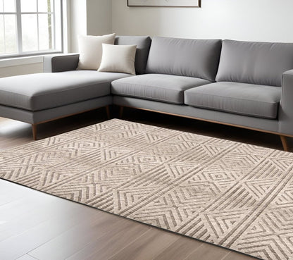 4' X 6' Tan Ivory And Brown Geometric Stain Resistant Area Rug