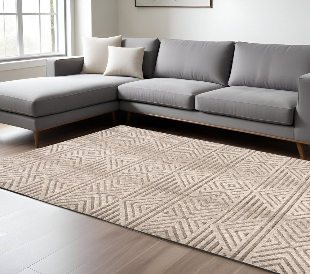 4' X 6' Tan Ivory And Brown Geometric Stain Resistant Area Rug