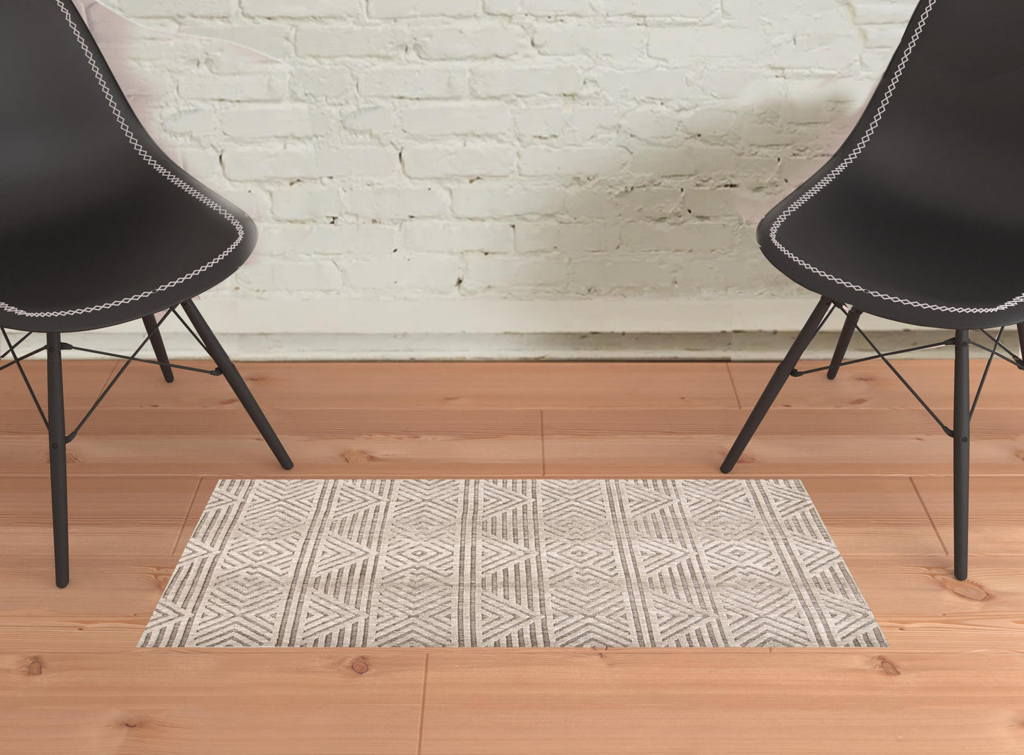 5' X 8' Tan Ivory And Brown Geometric Stain Resistant Area Rug