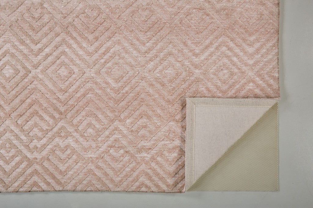 5' X 8' Pink And Ivory Geometric Stain Resistant Area Rug