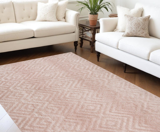 4' X 6' Pink And Ivory Geometric Stain Resistant Area Rug