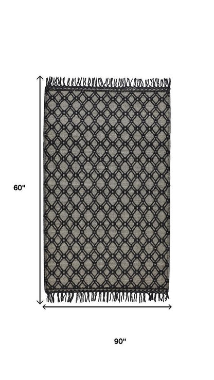 5' X 8' Black And Ivory Wool Geometric Hand Woven Area Rug With Fringe