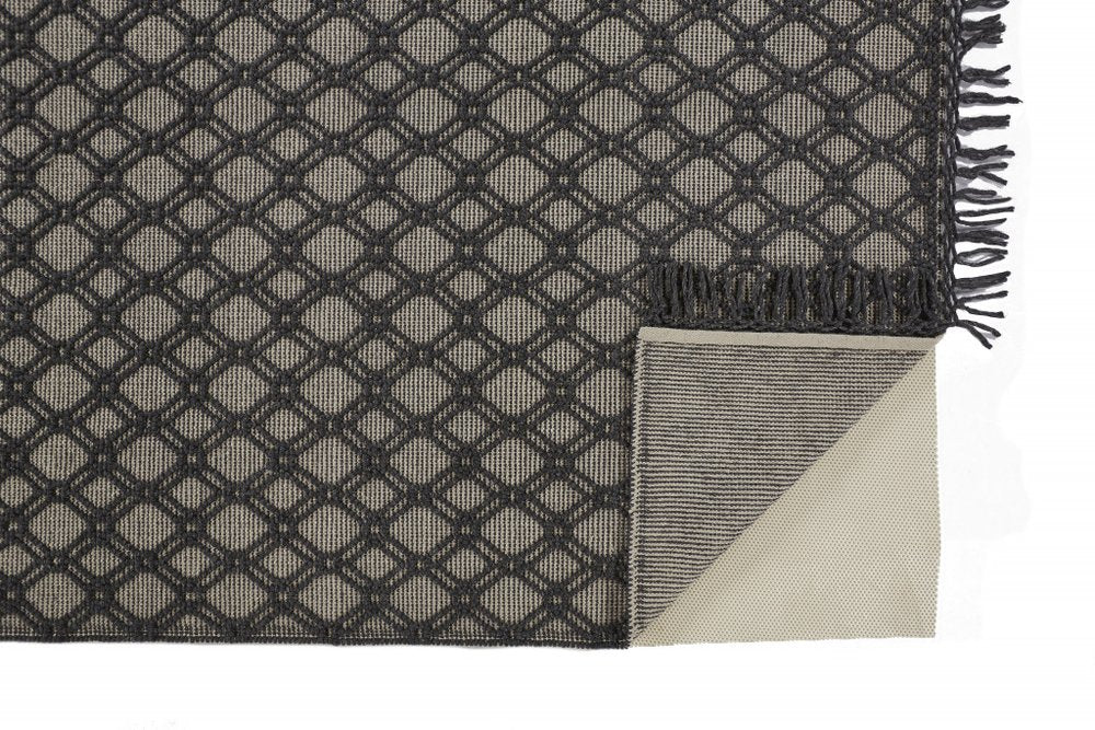 5' X 8' Black And Ivory Wool Geometric Hand Woven Area Rug With Fringe