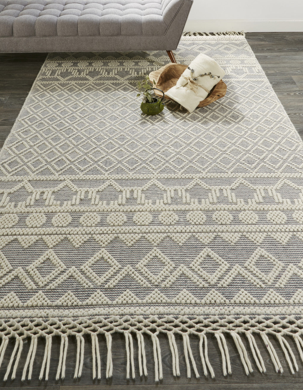 5' X 8' Ivory And Tan Wool Geometric Hand Woven Area Rug With Fringe