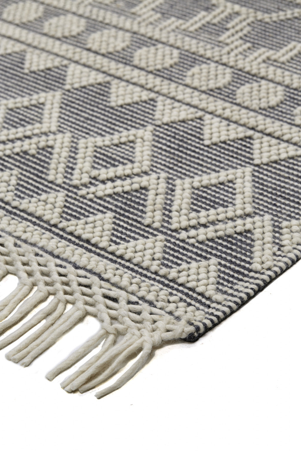 5' X 8' Ivory And Tan Wool Geometric Hand Woven Area Rug With Fringe