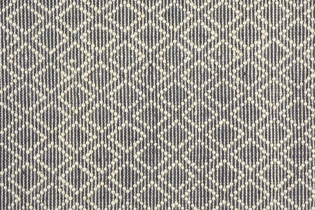 5' X 8' Ivory And Tan Wool Geometric Hand Woven Area Rug With Fringe