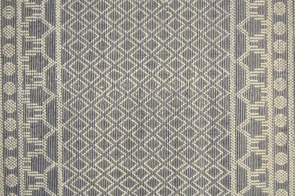 5' X 8' Ivory And Tan Wool Geometric Hand Woven Area Rug With Fringe