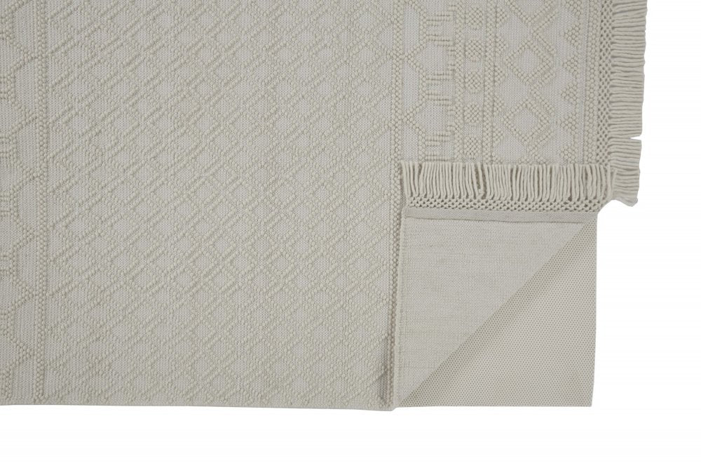 5' X 8' Ivory Wool Geometric Hand Woven Area Rug With Fringe