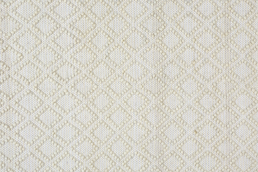 5' X 8' Ivory And Tan Wool Geometric Hand Woven Area Rug With Fringe