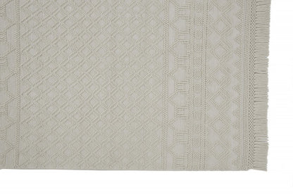 5' X 8' Ivory Wool Geometric Hand Woven Area Rug With Fringe