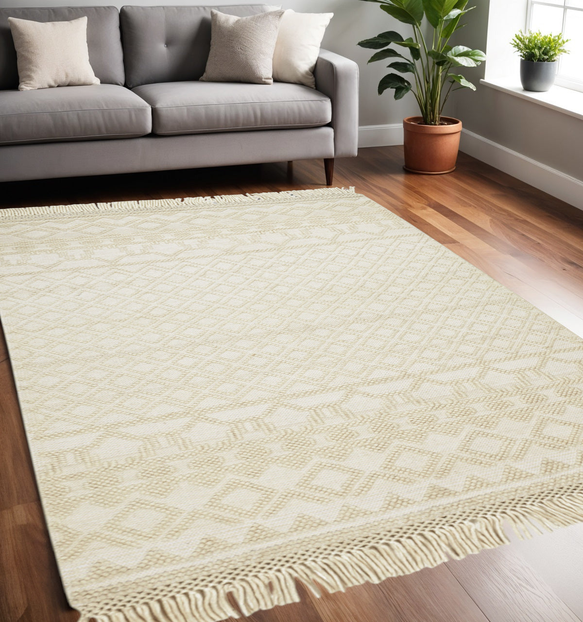 5' X 8' Ivory Wool Geometric Hand Woven Area Rug With Fringe