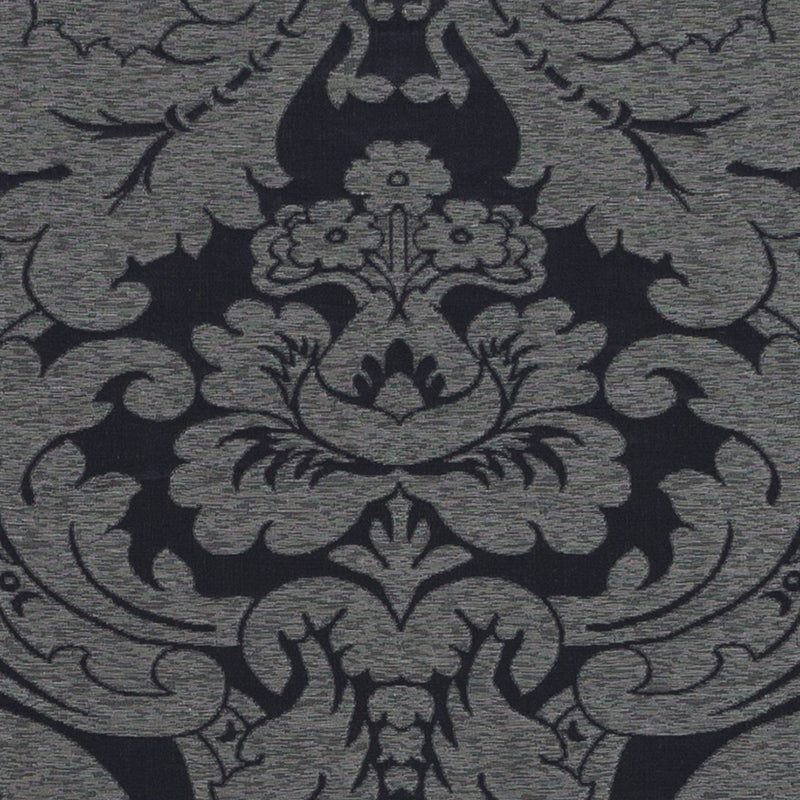 Charcoal gray damask fabric with black ornate floral scrollwork for elegant upholstery or wall decor.