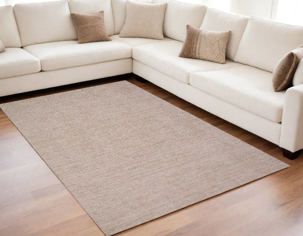 5' X 8' Pink and Ivory Hand Woven Area Rug