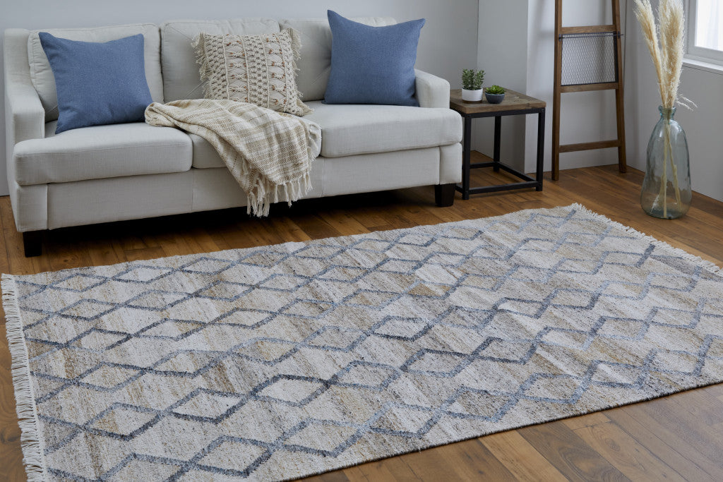 5' X 8' Gray Ivory And Tan Geometric Hand Woven Stain Resistant Area Rug With Fringe